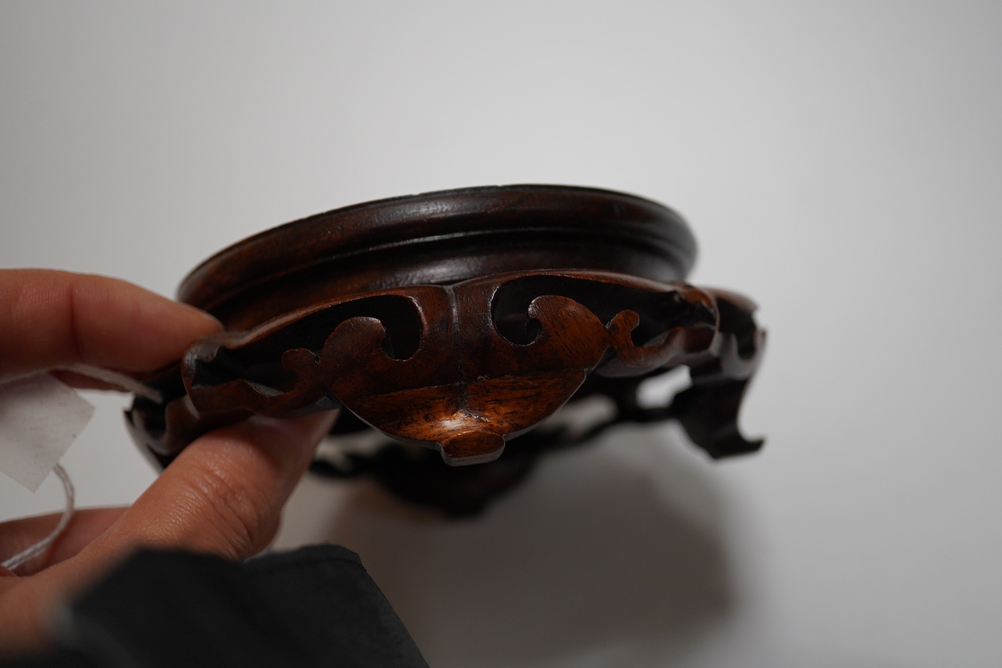 A Japanese Satsuma pottery box and cover on stand, box and cover 14.5cm diameter. Condition - crack to bowl of box and some scratches to surface glazing